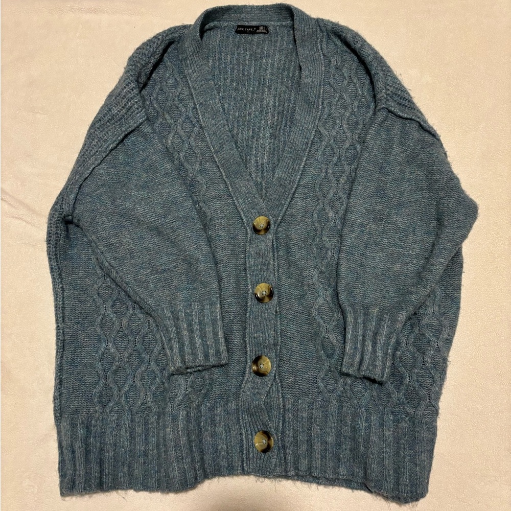Black tape blue sweater